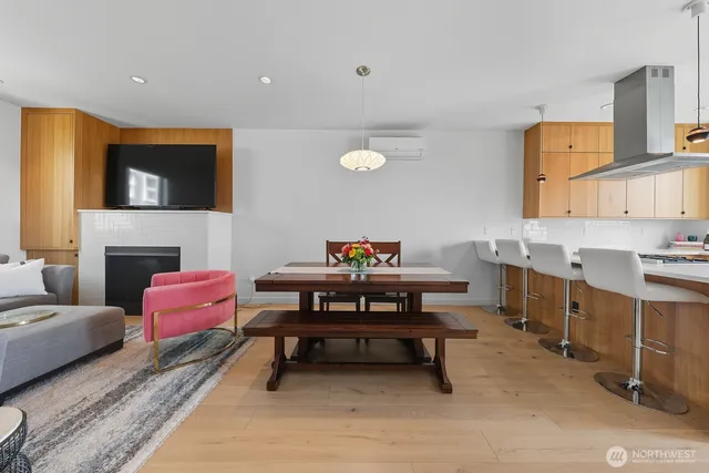 a living room with furniture fireplace and a flat screen tv