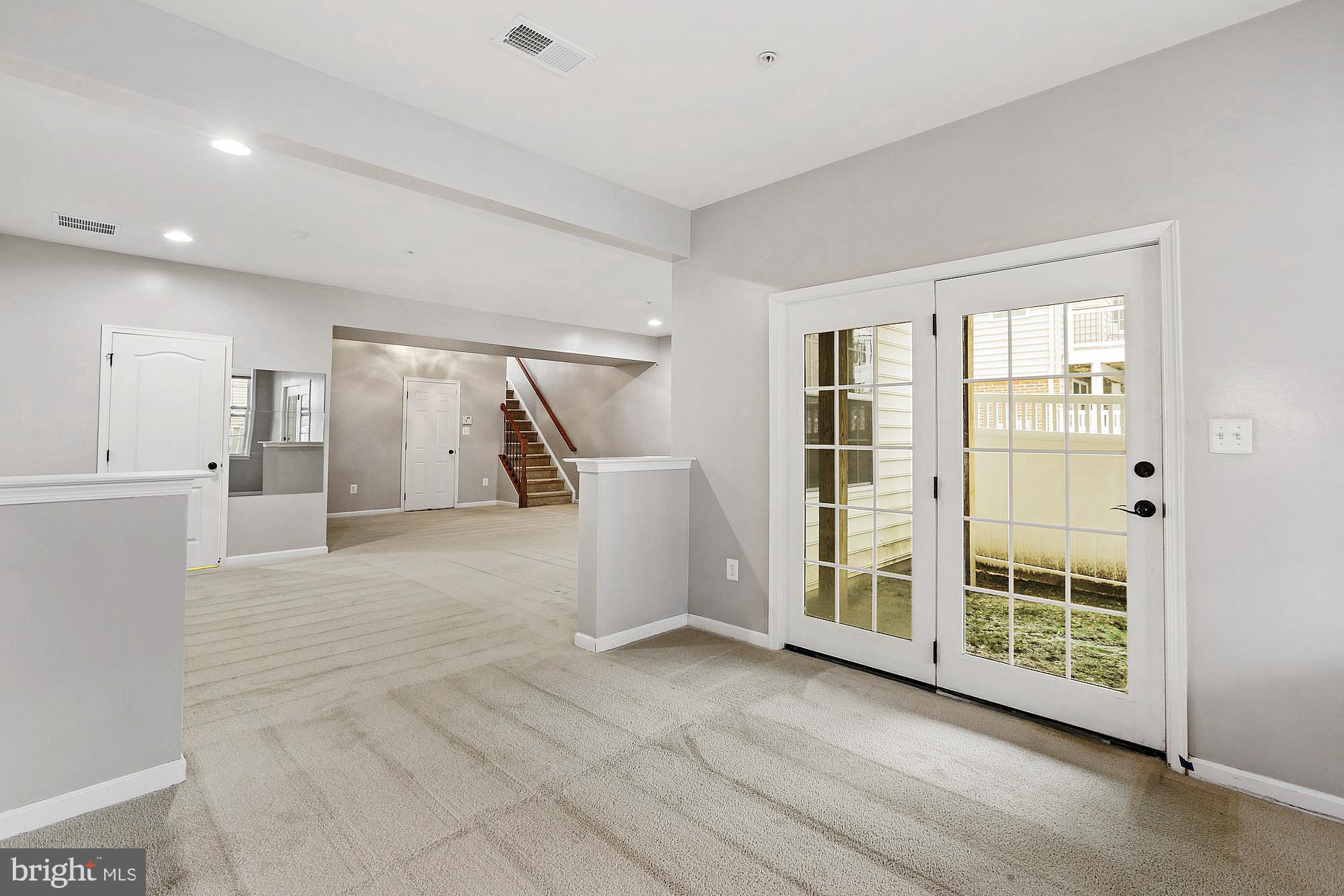 11007 Buggy Path Upper Marlboro, MD 20772 - Photo 14 of 18 a view of an empty room with a window