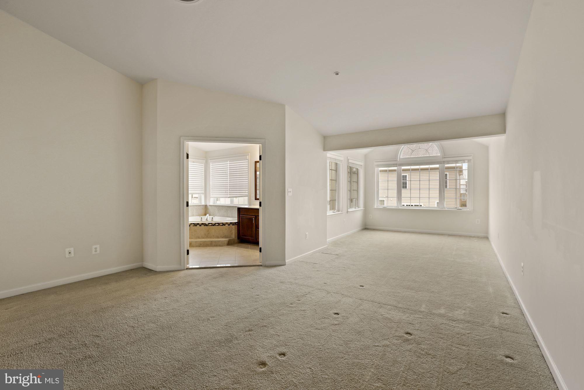 11007 Buggy Path Upper Marlboro, MD 20772 - Photo 6 of 18 an empty room with a bathroom