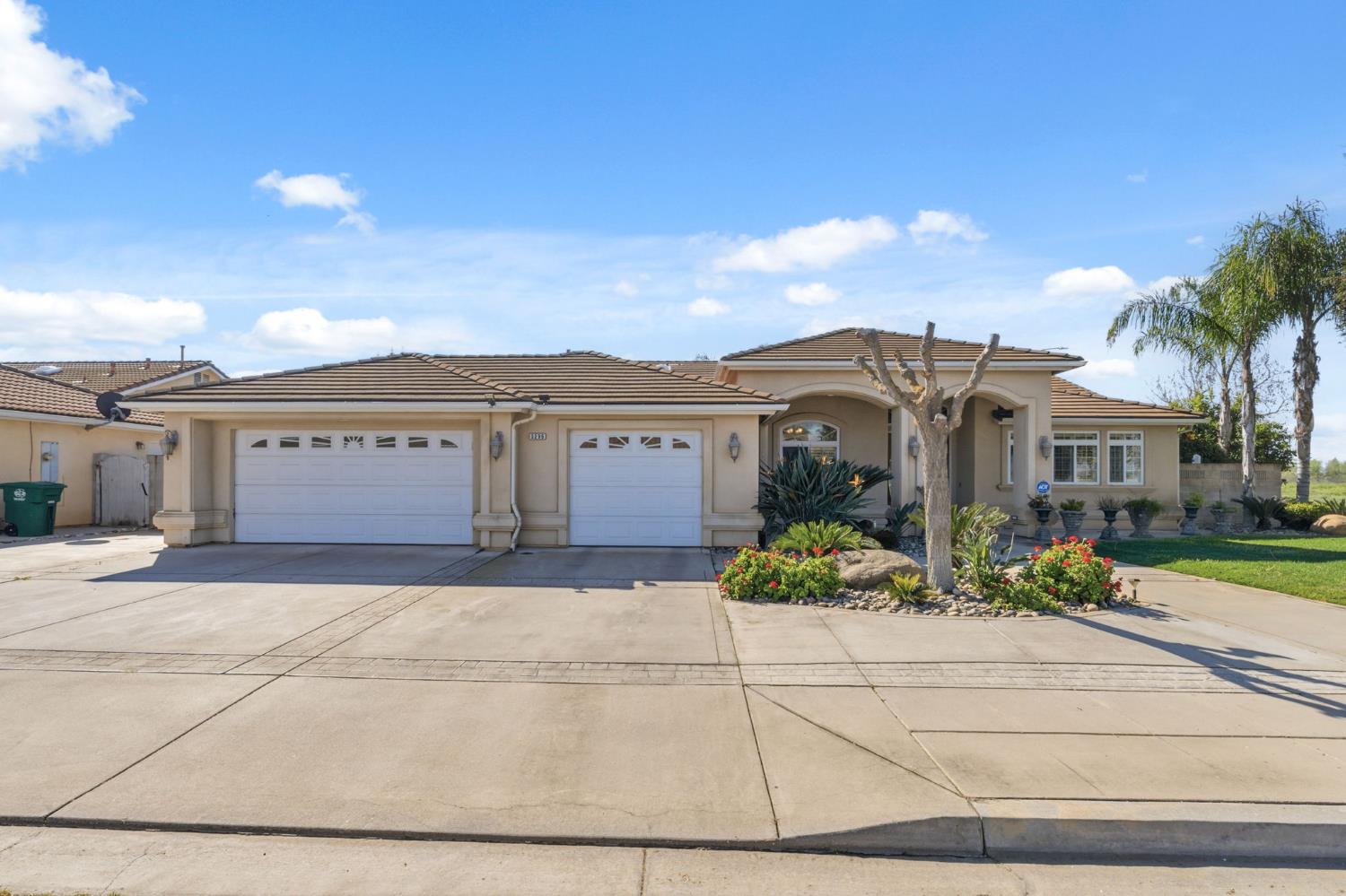 3296 Hollow Avenue Madera, CA 93637 - Photo 2 of 45 front view of house with a yard
