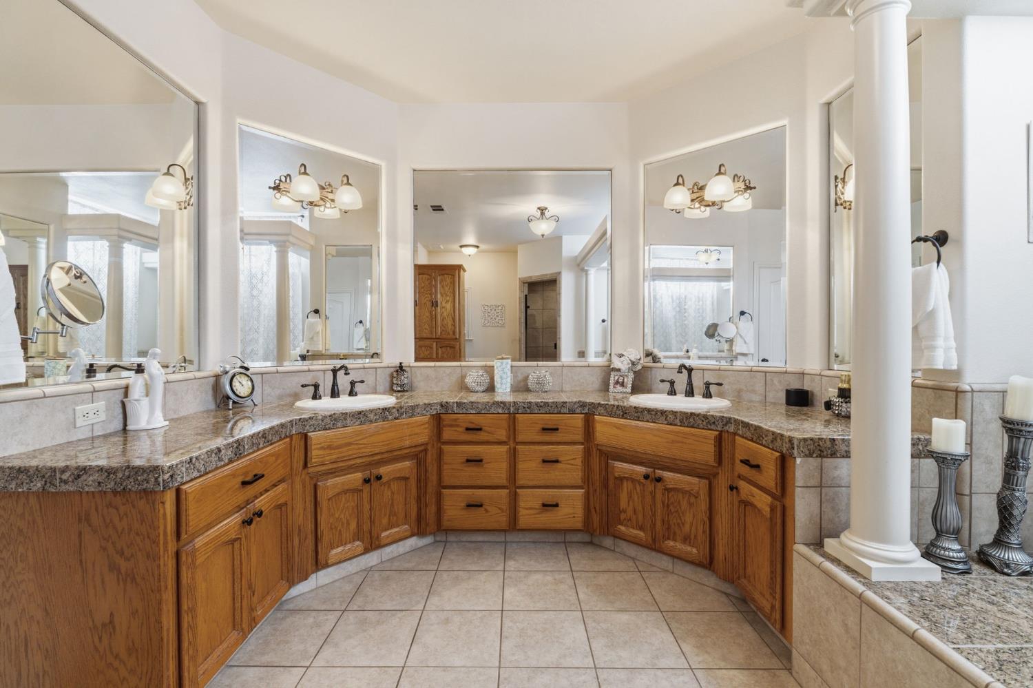 3296 Hollow Avenue Madera, CA 93637 - Photo 27 of 45 a large kitchen with a lot of counter space and a sink