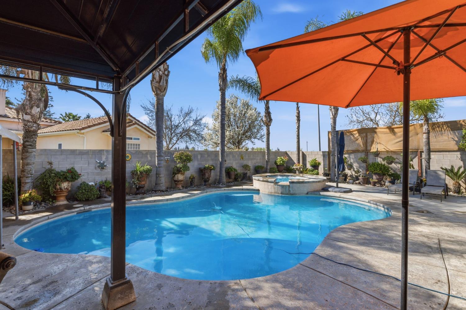 3296 Hollow Avenue Madera, CA 93637 - Photo 33 of 45 a view of swimming pool with patio