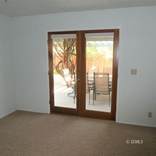 1104 North Inyo Street Ridgecrest, CA 93555 - Photo 22 of 31 a view of an empty room with a window