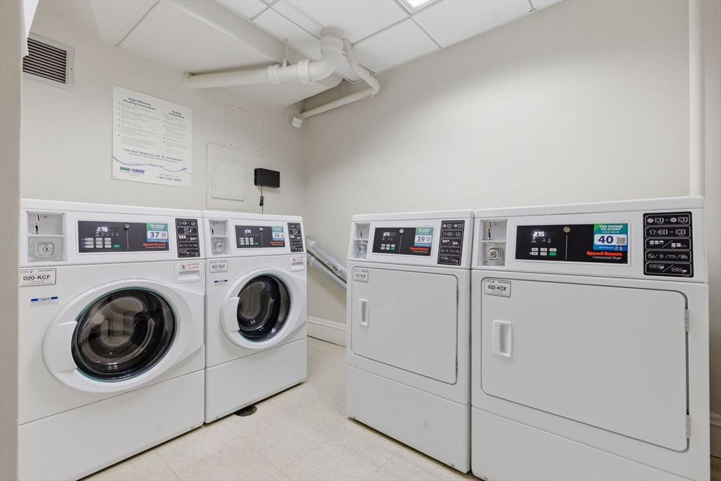 21 Beacon Street, Unit 11L Boston, MA 02108 - Photo 10 of 23 a utility room with dryer and washer