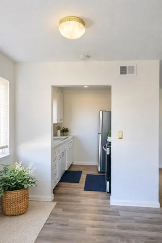 a bathroom with a sink and mirror