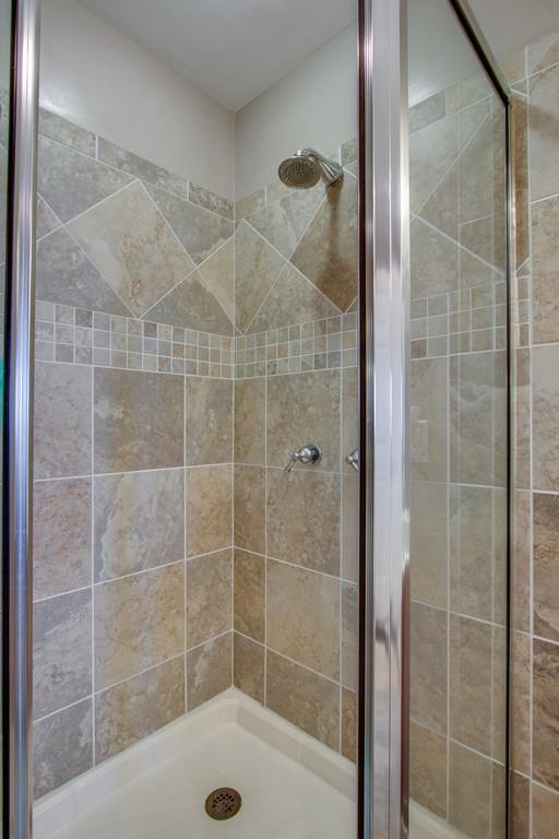 7100 Dale Ridge Road, Unit E3 Lancaster, TN 38569 - Photo 18 of 30 a bathroom with a shower and a sink