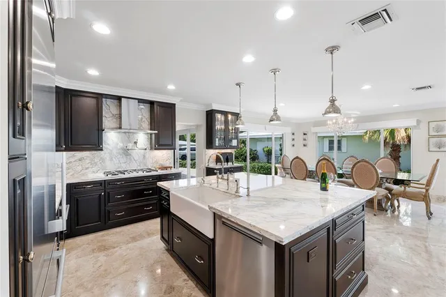 a front view of a house with a garden and yard