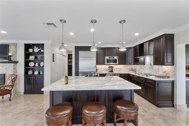 a view of a chairs and table in the terrace