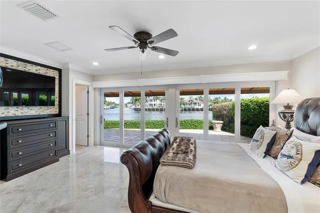 a view of swimming pool with a bench and a lawn chairs