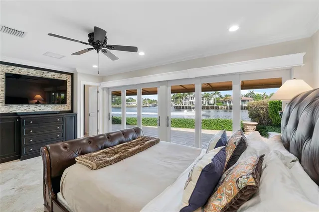a living room with furniture flat screen tv and a fireplace