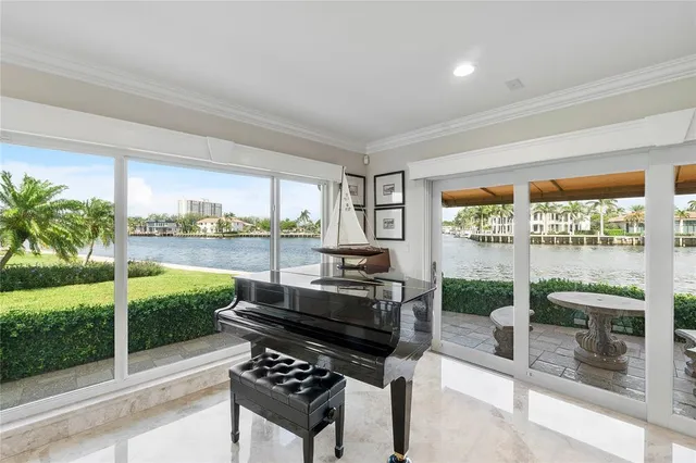 a open kitchen with stainless steel appliances granite countertop a sink stove and refrigerator