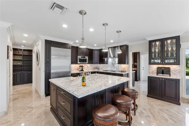 a bed room with a bed television and a large window