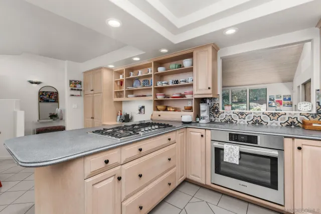 a view of a workspace with furniture