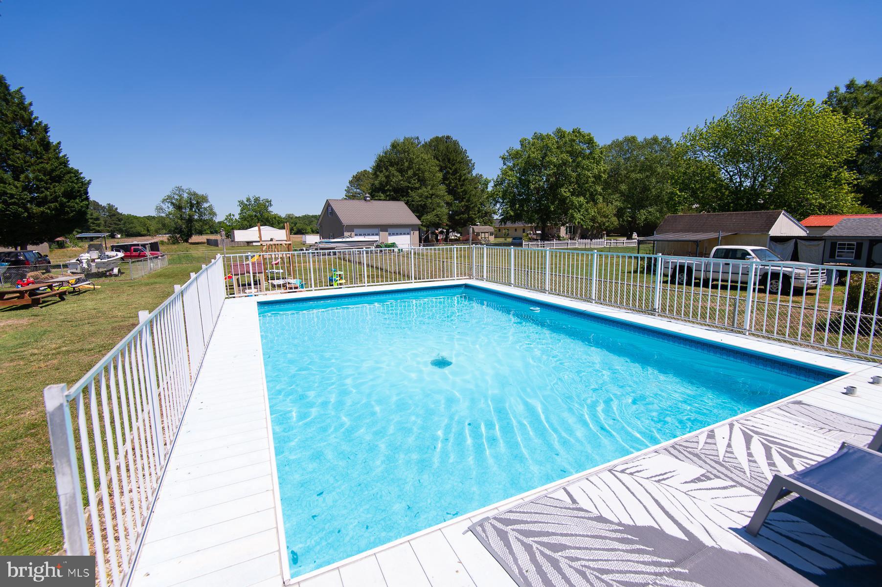 12 North Maple Avenue Ridgely, MD 21660 - Photo 13 of 30 a view of a swimming pool with a deck