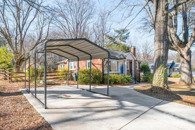 a view of a street with houses