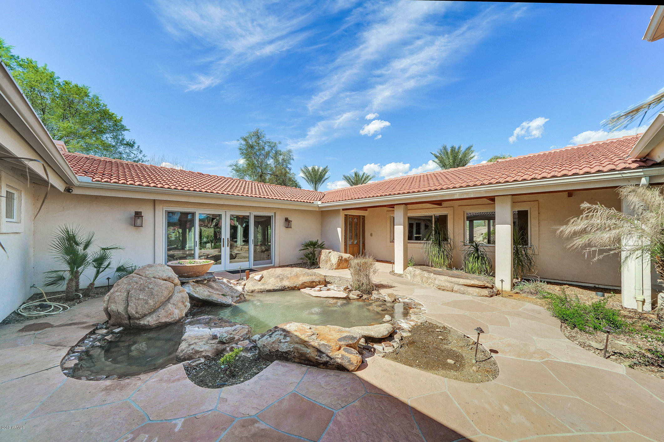 28331 West Rocking Horse Lane Morristown, AZ 85342 - Photo 13 of 85 203-MainHouse_Courtyard_1