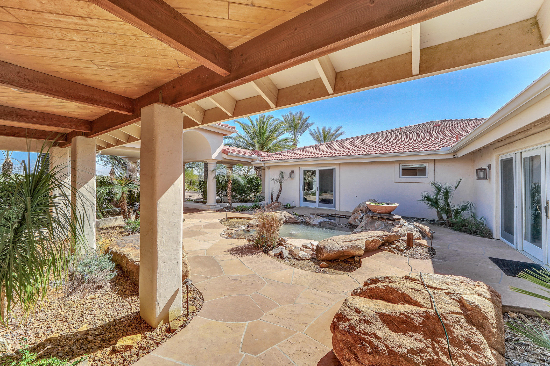 28331 West Rocking Horse Lane Morristown, AZ 85342 - Photo 14 of 85 204-MainHouse_Courtyard_Entry