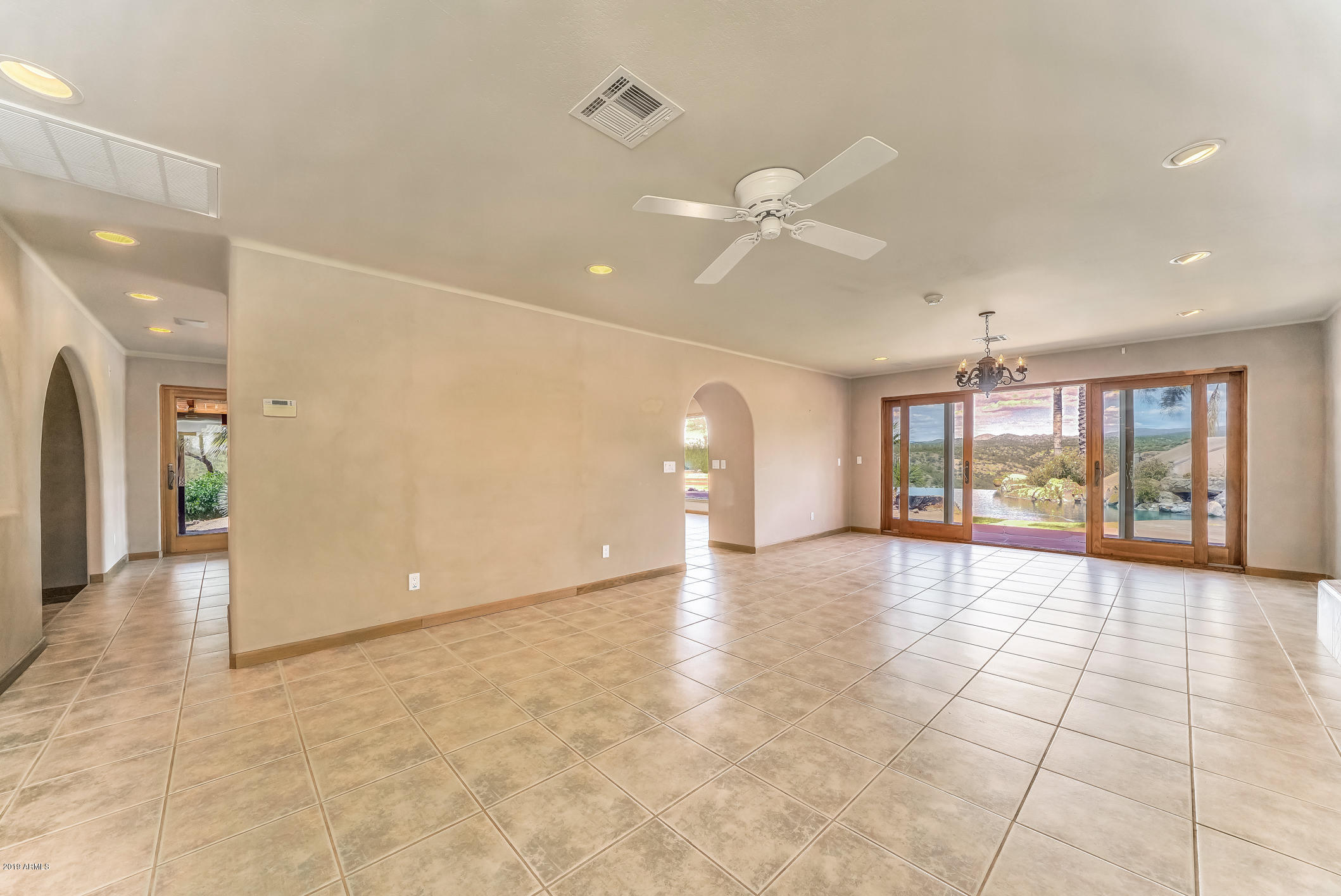 28331 West Rocking Horse Lane Morristown, AZ 85342 - Photo 15 of 85 204.8-EntryView_LivingRoom_1