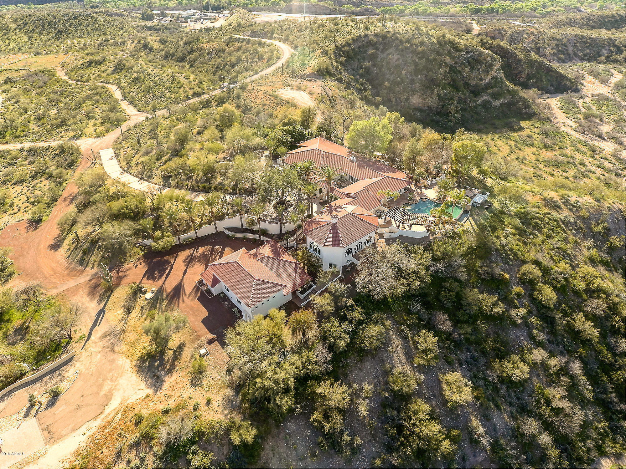 28331 West Rocking Horse Lane Morristown, AZ 85342 - Photo 4 of 85 104-Aerial_RearOverview_Left