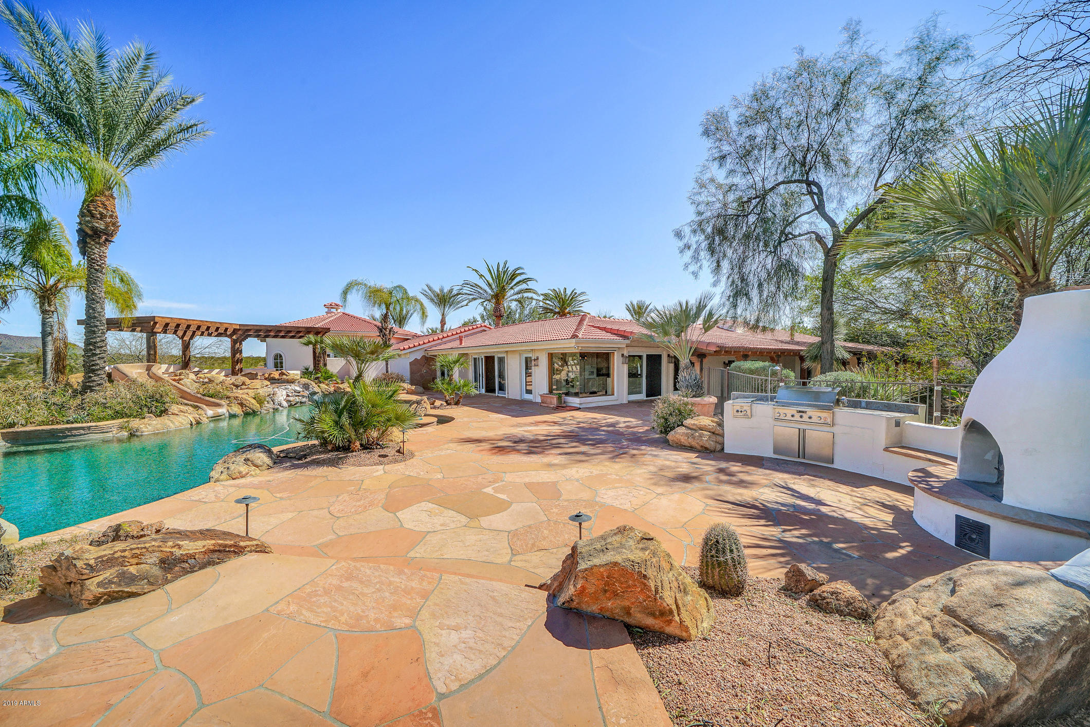 28331 West Rocking Horse Lane Morristown, AZ 85342 - Photo 63 of 85 240-RearPatio_Exterior_Right