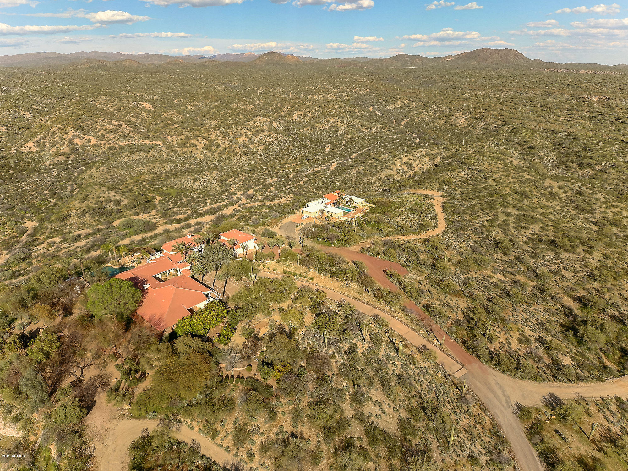 28331 West Rocking Horse Lane Morristown, AZ 85342 - Photo 7 of 85 107-Aerial_FrontLeft_Overview