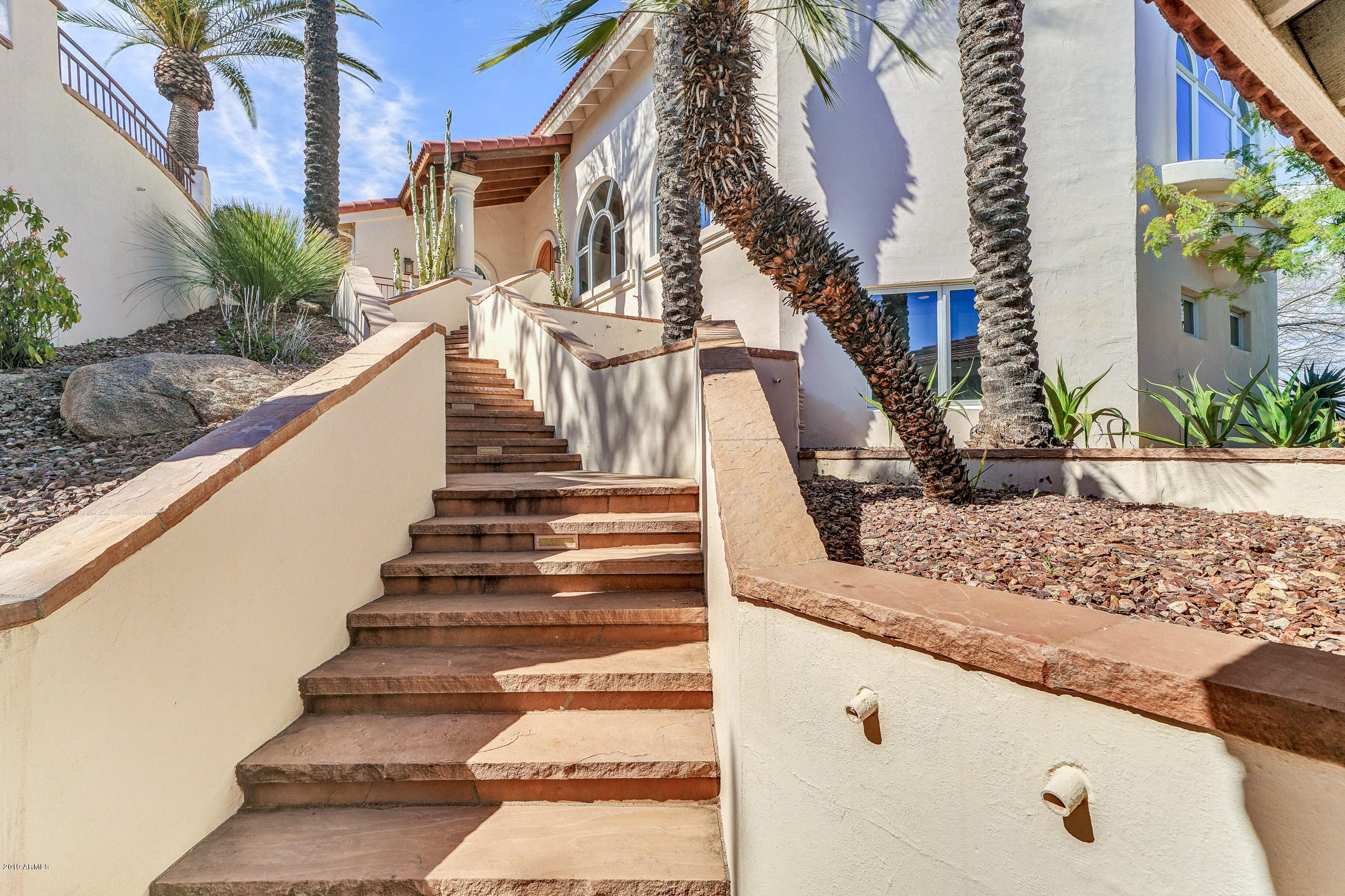 28331 West Rocking Horse Lane Morristown, AZ 85342 - Photo 74 of 85 255-Garage_Stairwell