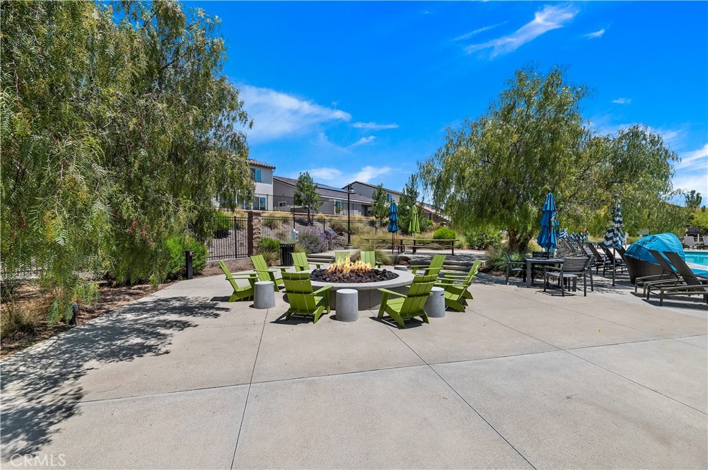 34108 Helenium Street Murrieta, CA 92563 - Photo 5 of 14 a view of outdoor space with seating area and trees around