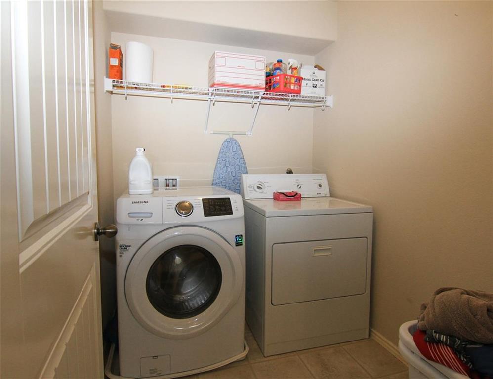 2705 Overton Street Round Rock, TX 78665 - Photo 17 of 19 a utility room with dryer and washer