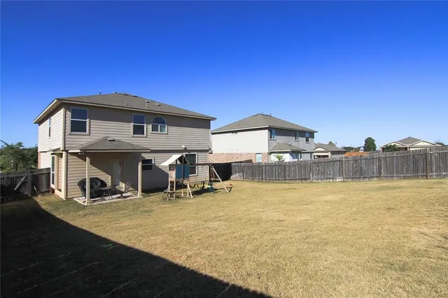 a view of a house with a swimming pool