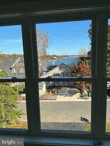 a bathroom with a sink toilet vanity and shower