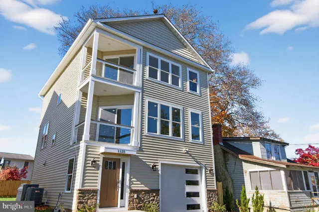 a view of a balcony with furniture