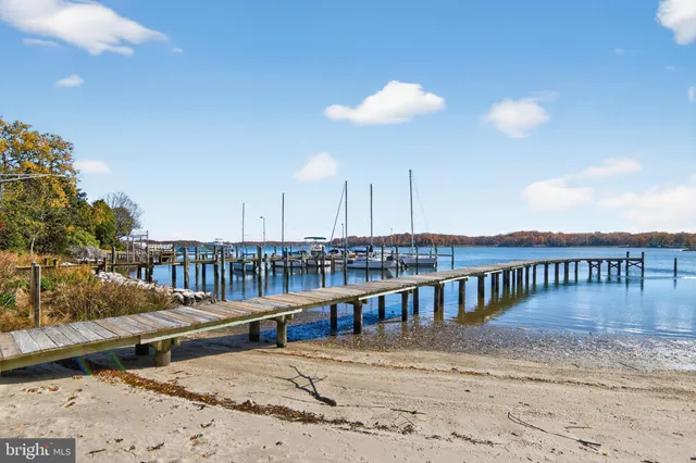 a view of park with wooden fence