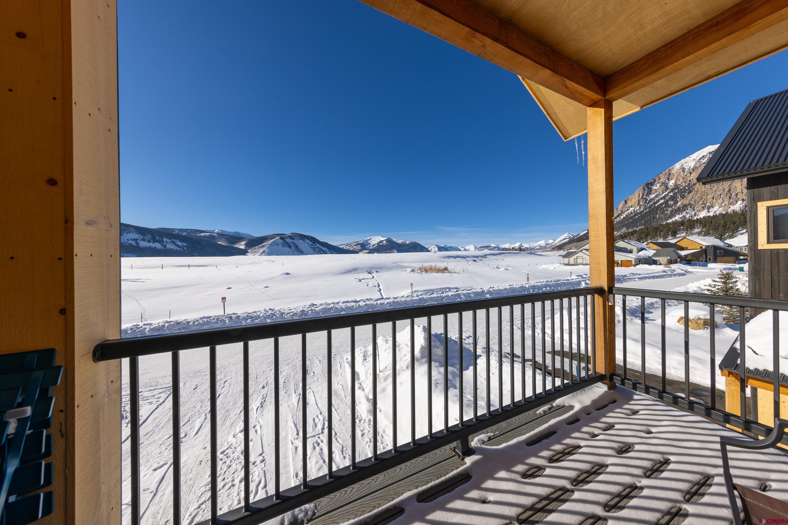 101 Elk Valley Road, Unit B Crested Butte, CO 81224 - Photo 20 of 33 a view of a balcony with wooden floor