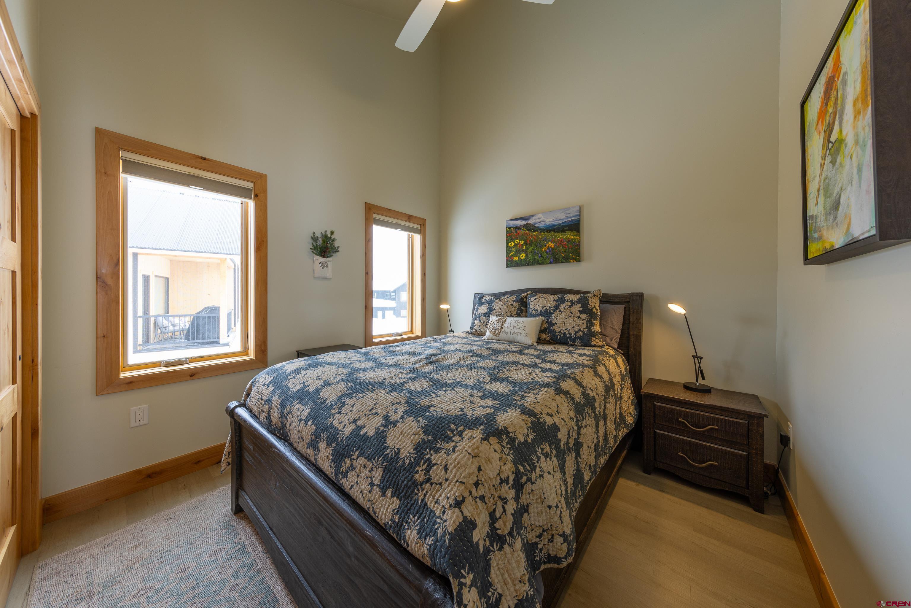 101 Elk Valley Road, Unit B Crested Butte, CO 81224 - Photo 21 of 33 a bedroom with a bed and a window