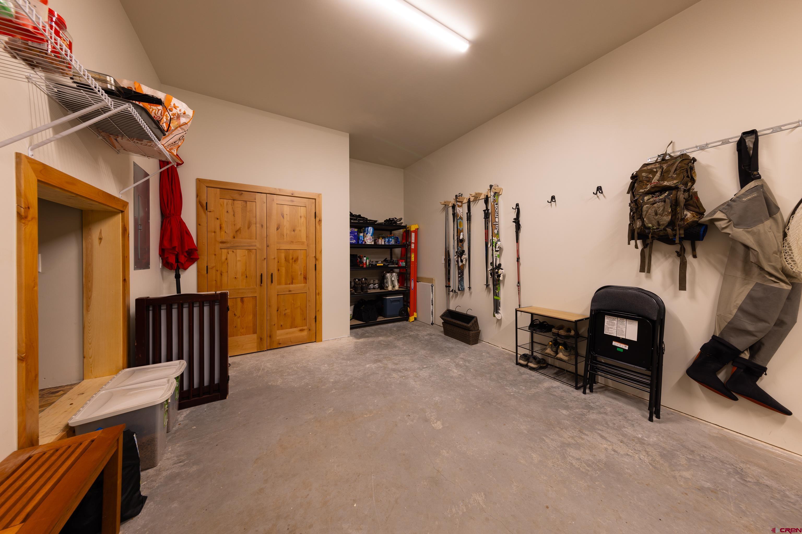 101 Elk Valley Road, Unit B Crested Butte, CO 81224 - Photo 31 of 33 a view of a livingroom with furniture and a gym equipment