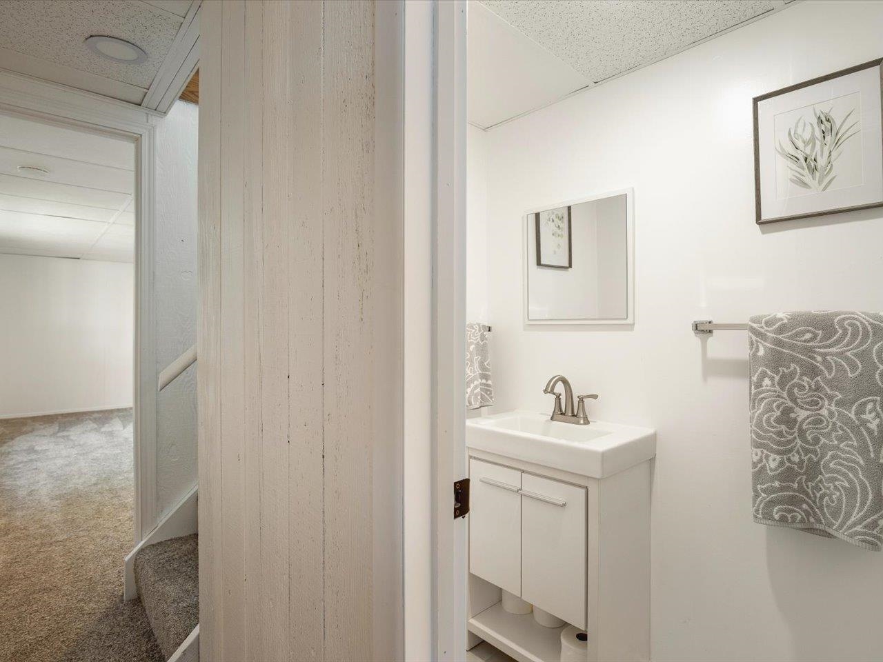 136 Lake Summerset Road Lake Summerset, IL 61019 - Photo 25 of 47 a bathroom with a sink and a mirror