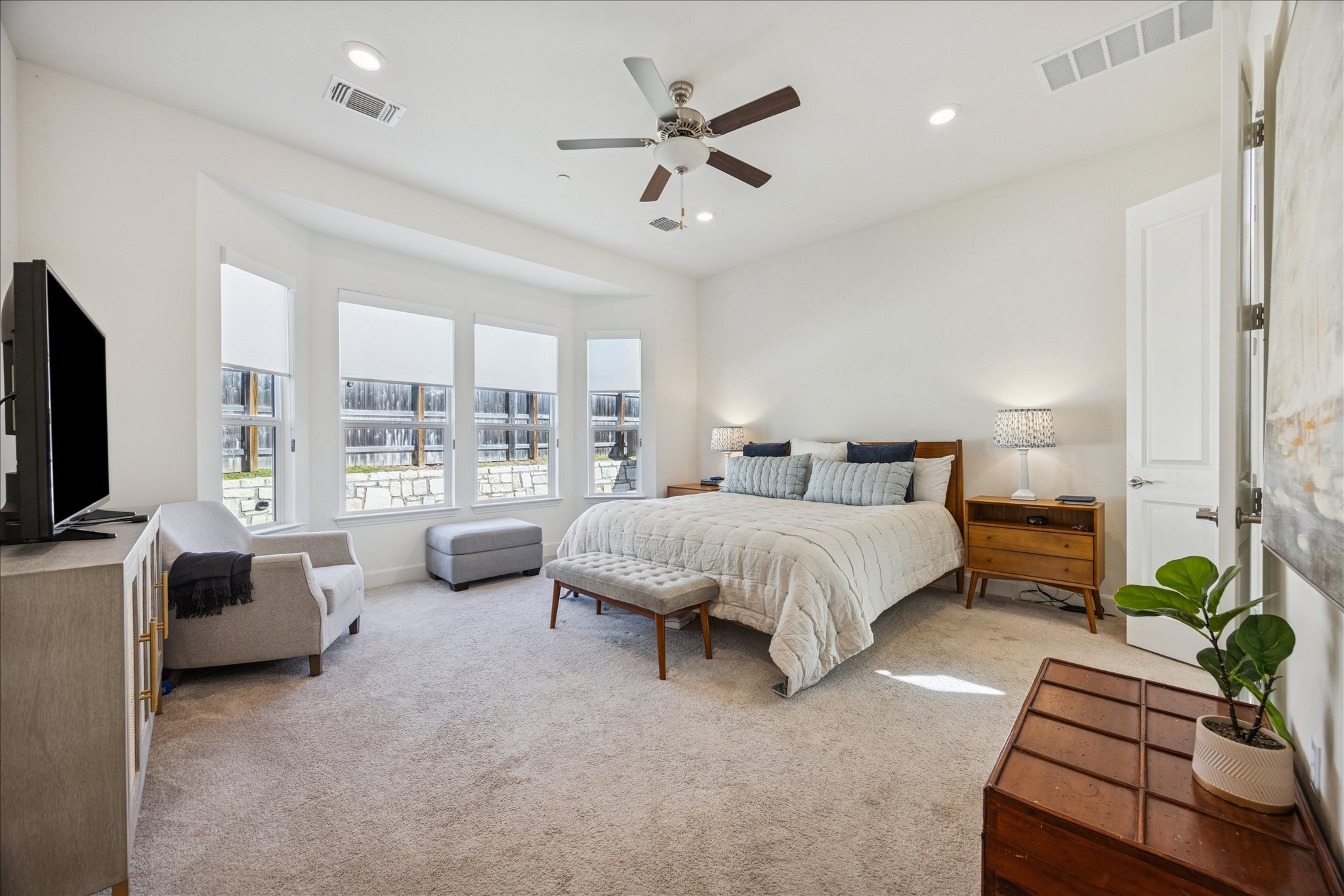 12507 Ayrshire Way, Unit 75 Austin, TX 78732 - Photo 15 of 40 Bedroom with light colored carpet, a ceiling fan, and recessed lighting