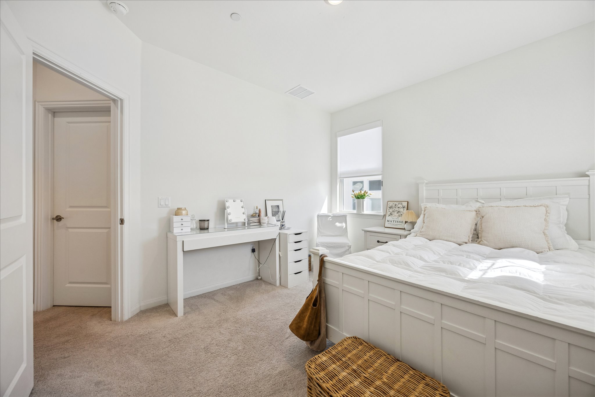 12507 Ayrshire Way, Unit 75 Austin, TX 78732 - Photo 24 of 40 Bedroom with light carpet and a desk