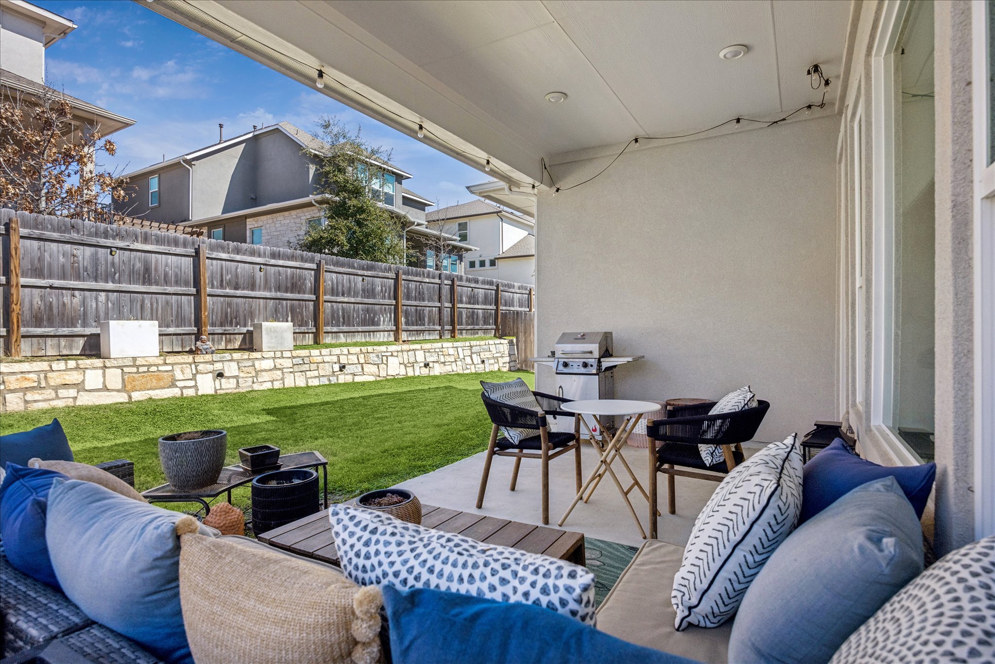 12507 Ayrshire Way, Unit 75 Austin, TX 78732 - Photo 31 of 40 View of patio featuring an outdoor living space and grilling area