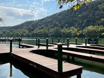 swimming pool view with a outdoor seating
