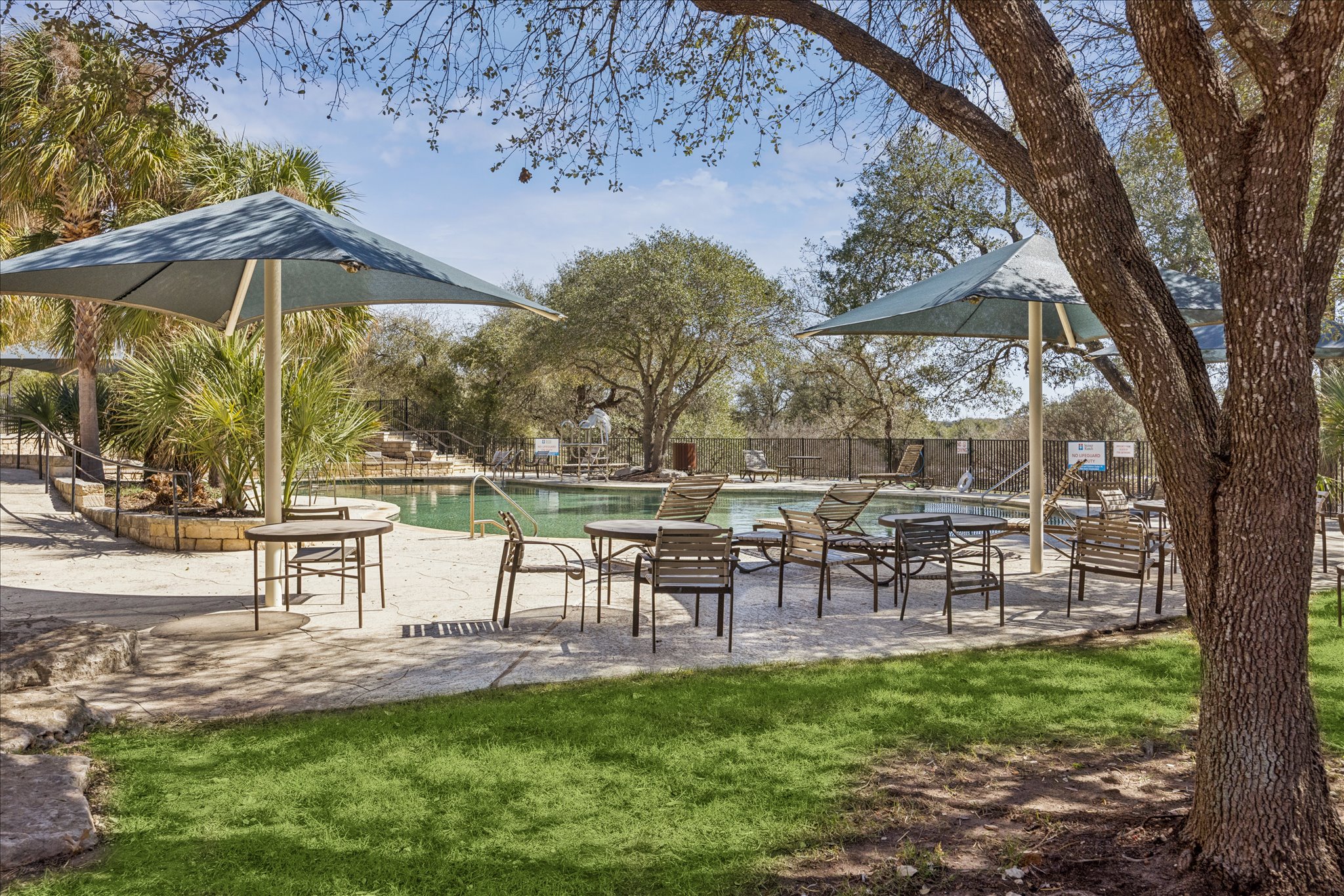 12507 Ayrshire Way, Unit 75 Austin, TX 78732 - Photo 36 of 40 View of property's community with a pool and a patio area