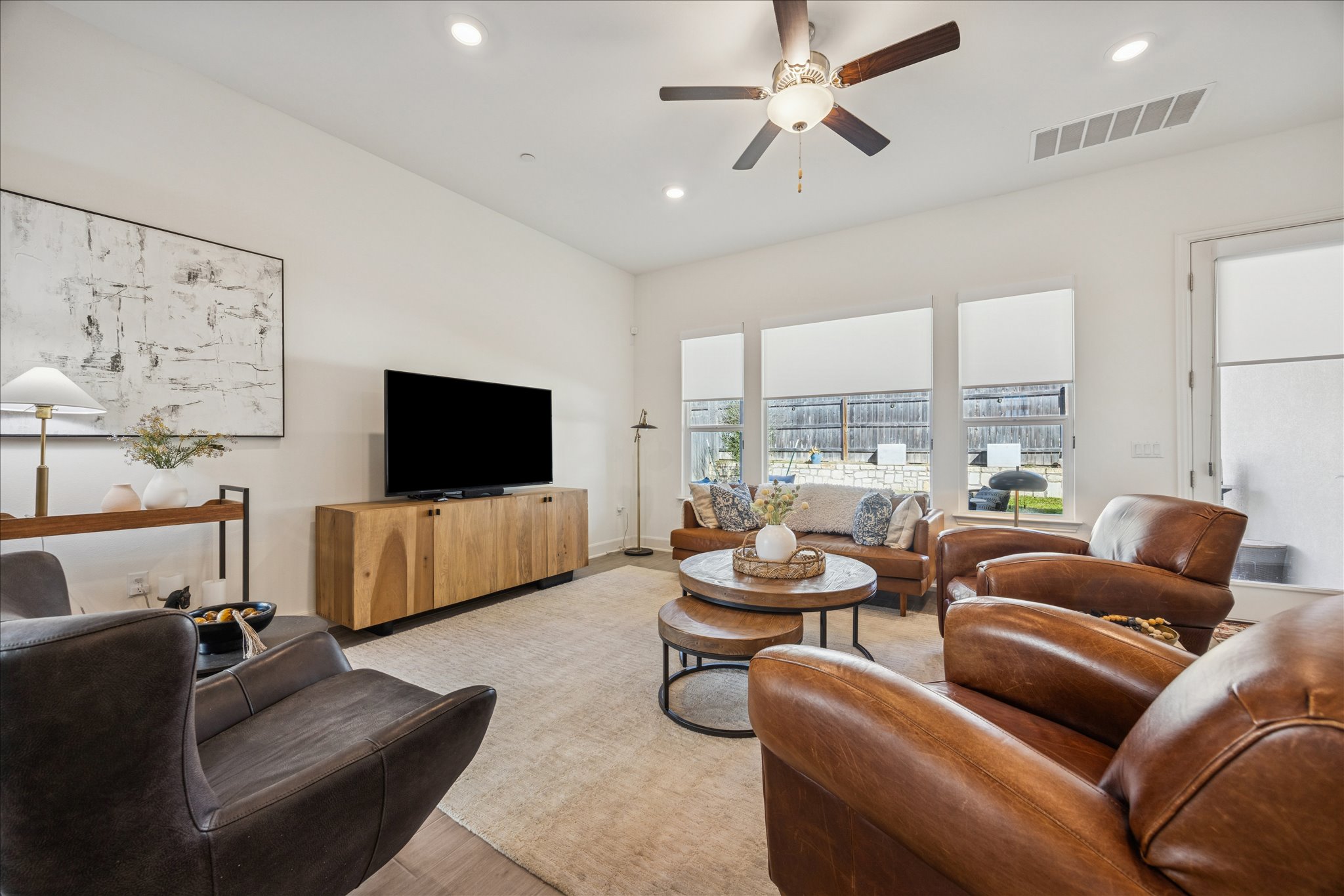 12507 Ayrshire Way, Unit 75 Austin, TX 78732 - Photo 7 of 40 Living room with ceiling fan, recessed lighting, and light wood-style floors