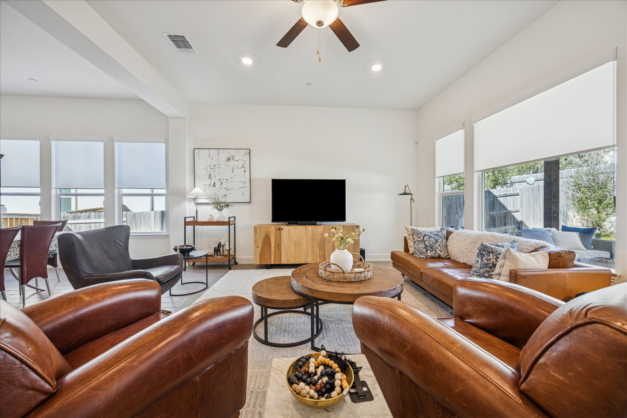 12507 Ayrshire Way, Unit 75 Austin, TX 78732 - Photo 8 of 40 Living room featuring ceiling fan and recessed lighting