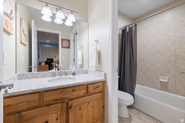 1625 Pages Pl Drive Bountiful, UT 84010 - Photo 24 of 31 Full bath with vanity, shower / bath combo with shower curtain, and light tile patterned flooring