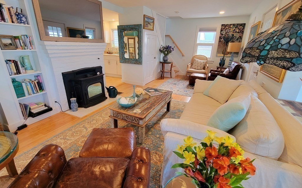 11 Harbor Street Newburyport, MA 01950 - Photo 14 of 39 a living room with furniture fireplace and a flat screen tv