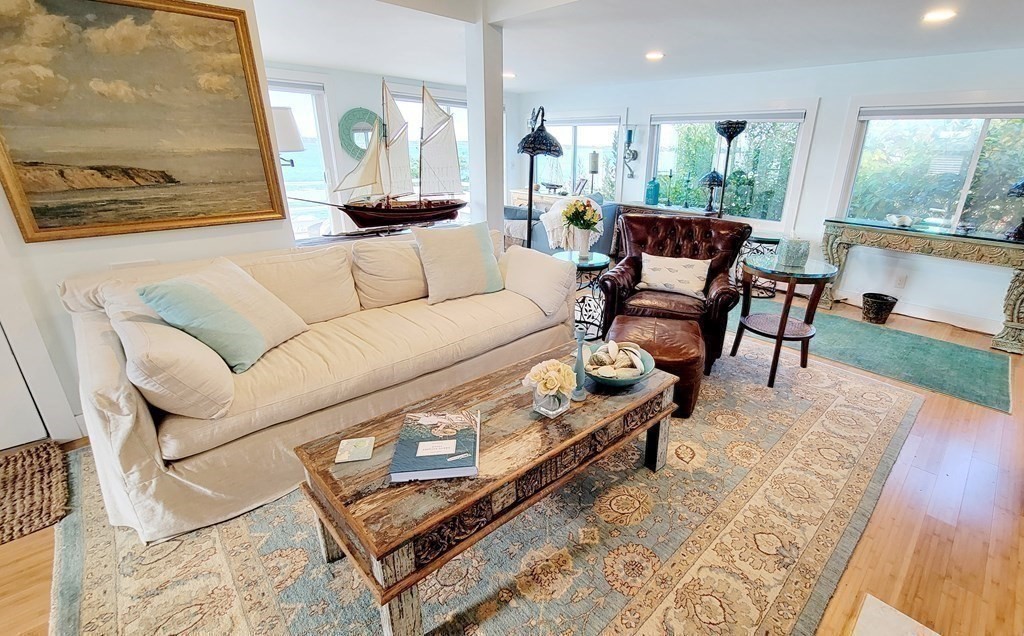 11 Harbor Street Newburyport, MA 01950 - Photo 15 of 39 a living room with furniture and a large window
