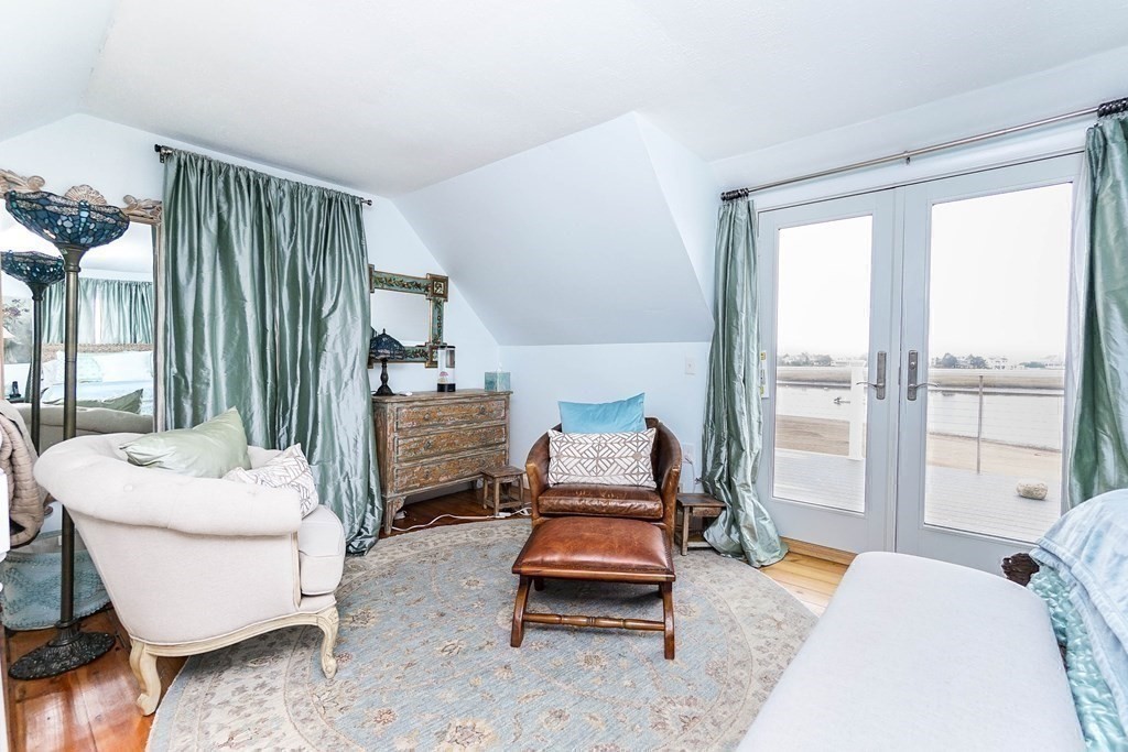 11 Harbor Street Newburyport, MA 01950 - Photo 23 of 39 a living room with furniture and a large window