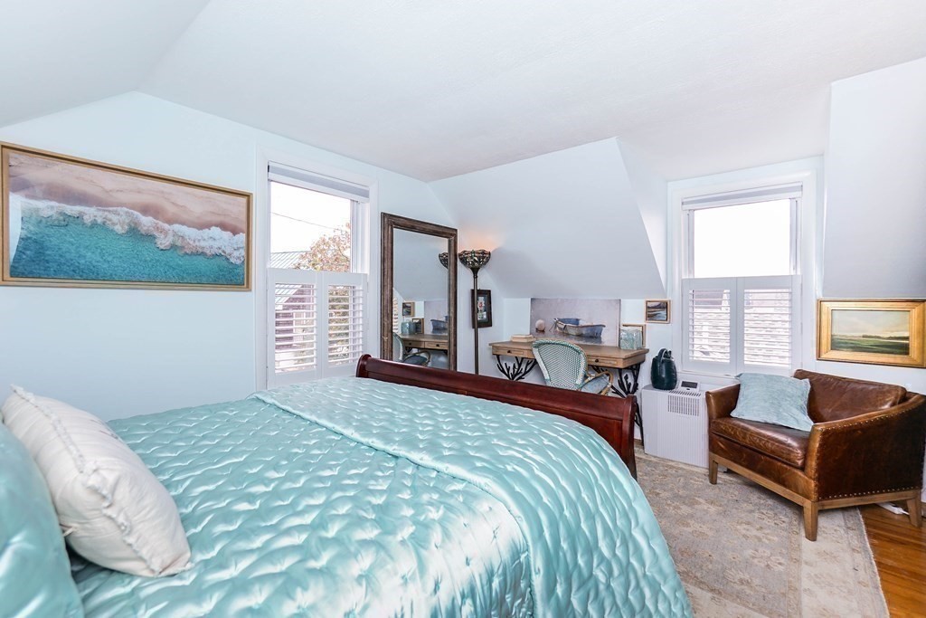 11 Harbor Street Newburyport, MA 01950 - Photo 24 of 39 a bedroom with a bed and a couch