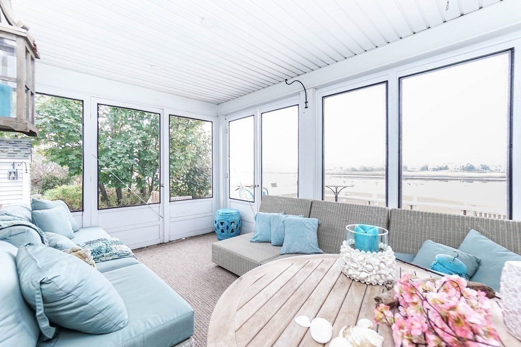 11 Harbor Street Newburyport, MA 01950 - Photo 31 of 39 a bedroom with furniture and large windows