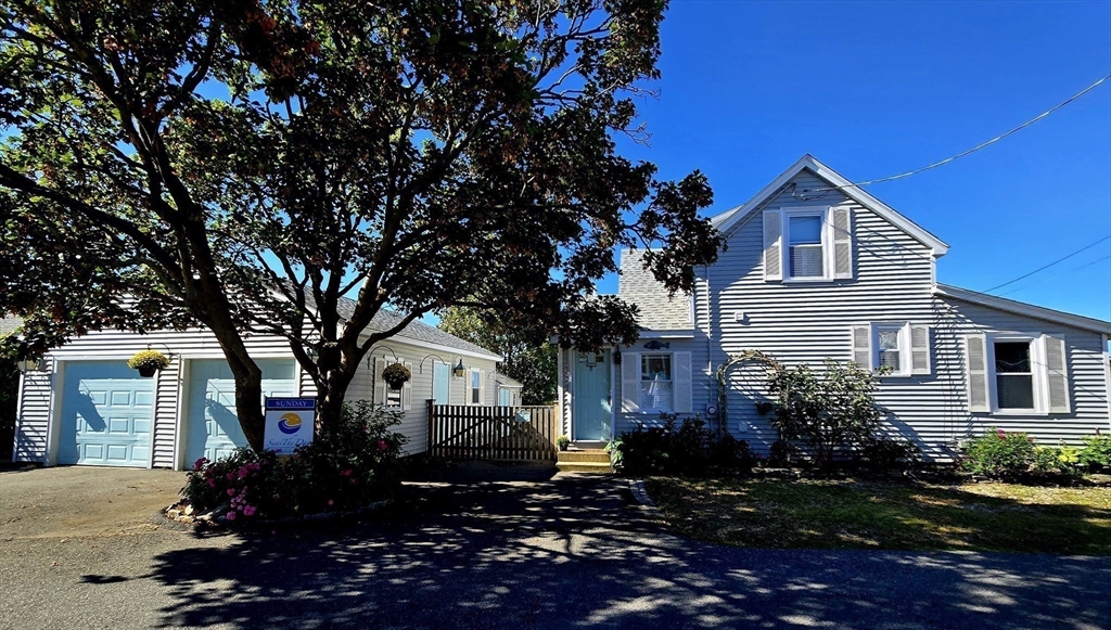 11 Harbor Street Newburyport, MA 01950 - Photo 8 of 39 a front view of a house with a yard